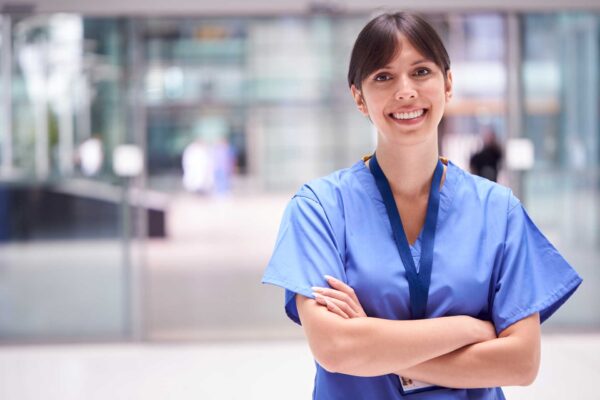 woman nurse standing and smiling